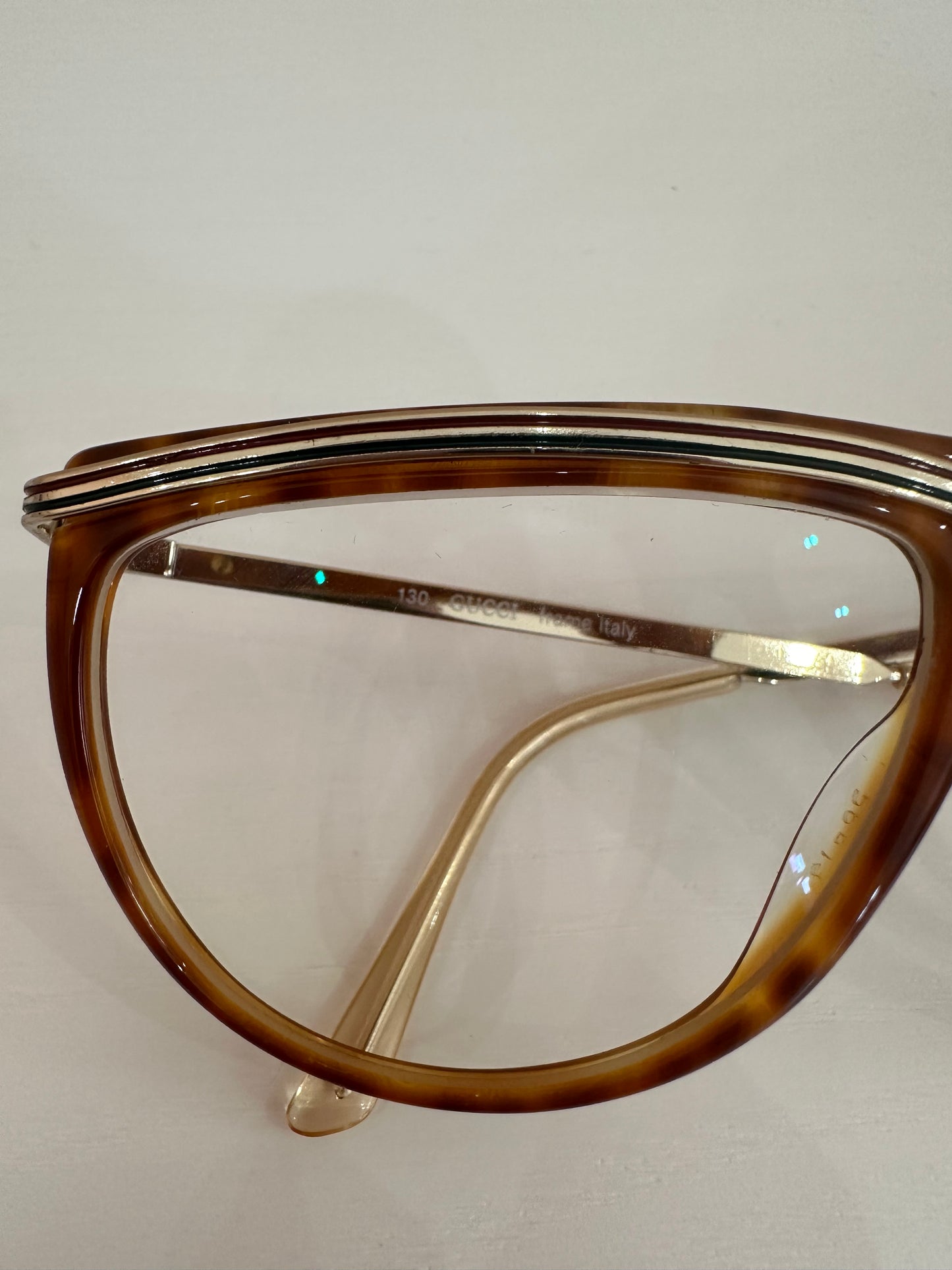 Occhiali Gucci vintage tartarugati, aste oro motivo web